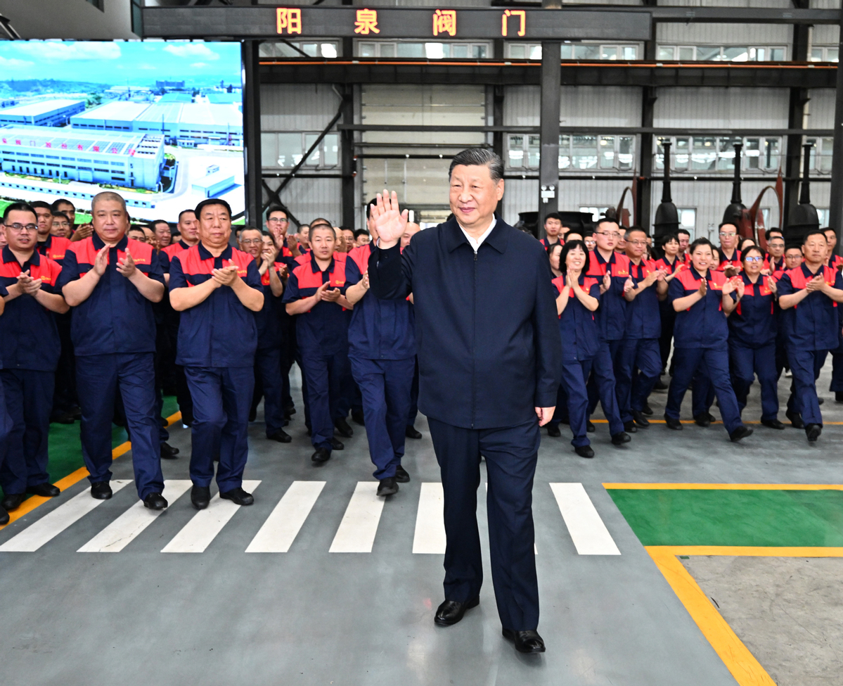 Xi stresses developing real economy to build up national strength